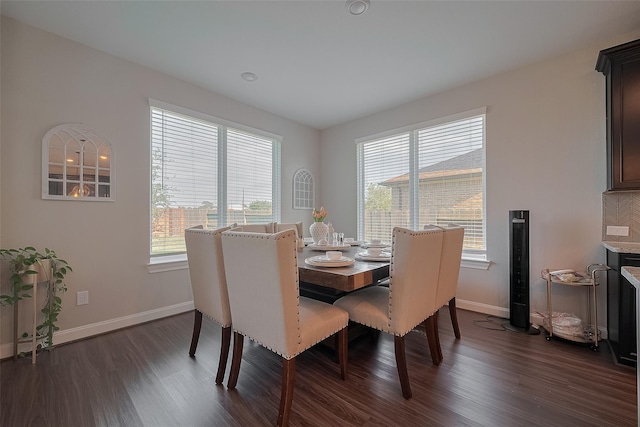 11527 Taagan Ln, Richmond, TX 77407 - dining space with dark wood-style floors and baseboards
