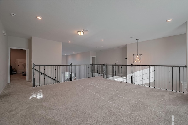 11527 Taagan Ln, Richmond, TX 77407 - carpeted empty room with a chandelier and recessed lighting