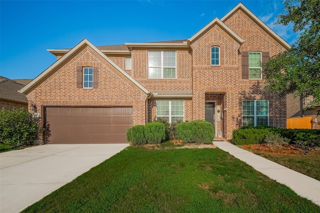 11527 Taagan Ln, Richmond, TX 77407 - traditional-style home with brick siding, a front lawn, driveway, and a garage