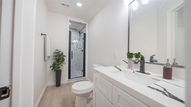 14223 Edenglen Dr, Houston, TX 77049 - bathroom with a shower stall, vanity, and wood finished floors