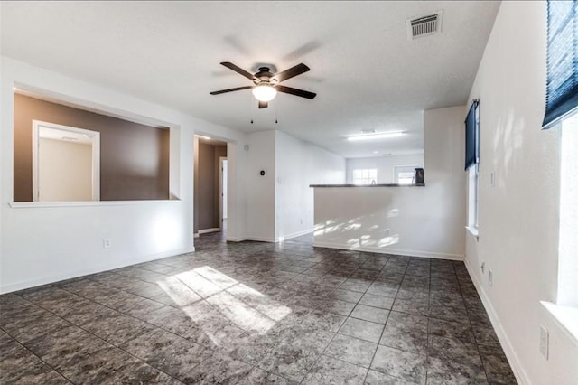 19346 Bold River Rd, Tomball, TX 77375 - unfurnished room featuring a ceiling fan and baseboards