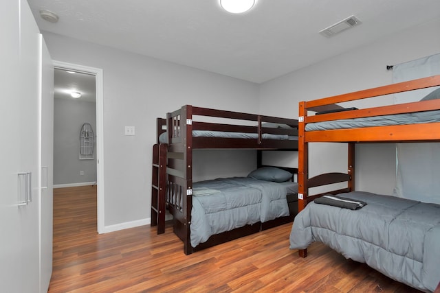 5822 Santa Bernadetta, Houston, TX 77017 - bedroom featuring wood finished floors and baseboards