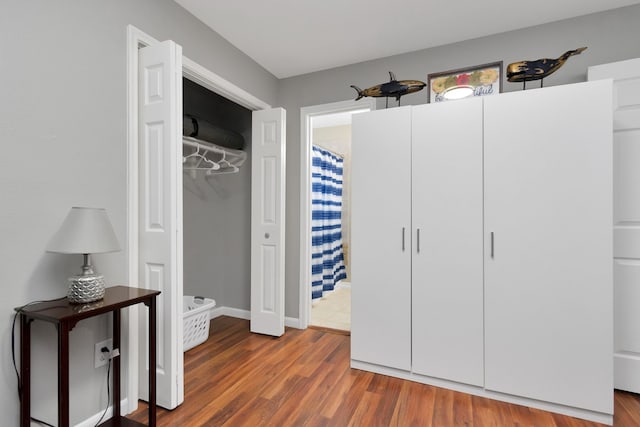 5822 Santa Bernadetta, Houston, TX 77017 - bedroom featuring wood finished floors and a closet