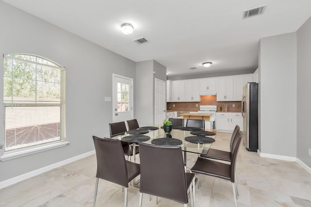 5822 Santa Bernadetta, Houston, TX 77017 - dining area with baseboards