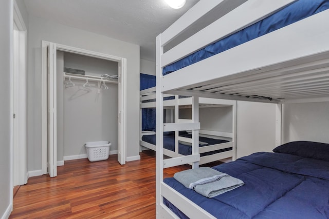 5822 Santa Bernadetta, Houston, TX 77017 - bedroom featuring wood finished floors and a closet