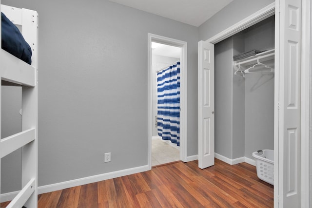 5822 Santa Bernadetta, Houston, TX 77017 - unfurnished bedroom with wood finished floors and a closet