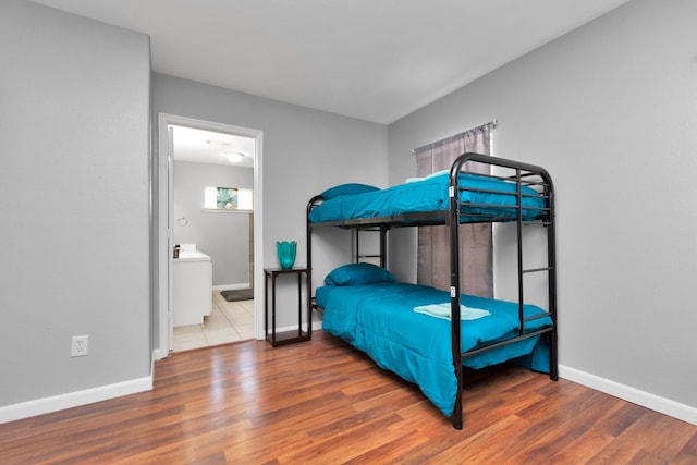 5822 Santa Bernadetta, Houston, TX 77017 - bedroom with wood finished floors and ensuite bath
