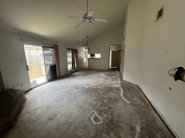 3122 Hirschfield Rd, Spring, TX 77373 - unfurnished living room featuring vaulted ceiling, a ceiling fan, and concrete floors