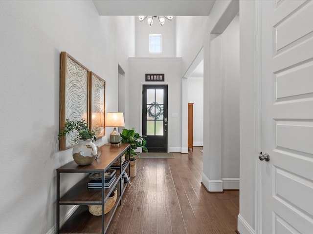 10814 Avery Arbor Ln, Cypress, TX 77433 - foyer with wood finished floors, a chandelier, and a high ceiling
