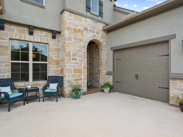 10814 Avery Arbor Ln, Cypress, TX 77433 - view of patio / terrace with driveway and a garage