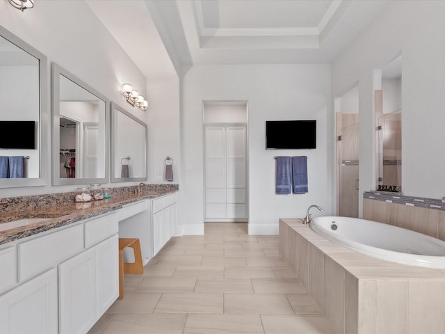 10814 Avery Arbor Ln, Cypress, TX 77433 - bathroom with a stall shower, double vanity, a garden tub, a tray ceiling, and a walk in closet