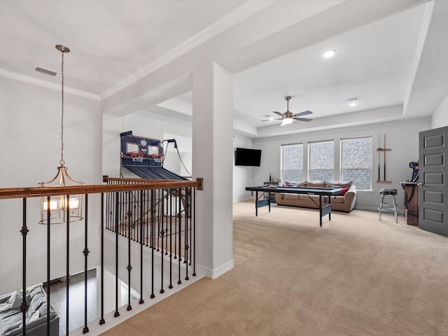 10814 Avery Arbor Ln, Cypress, TX 77433 - playroom with carpet flooring, a ceiling fan, ornamental molding, a raised ceiling, and recessed lighting