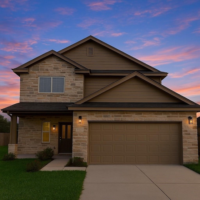 4301 Clover St, Houston, TX 77051 - traditional-style house featuring stone siding, concrete driveway, and a garage