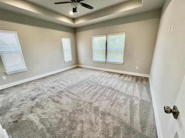4301 Clover St, Houston, TX 77051 - carpeted empty room featuring a tray ceiling and a ceiling fan