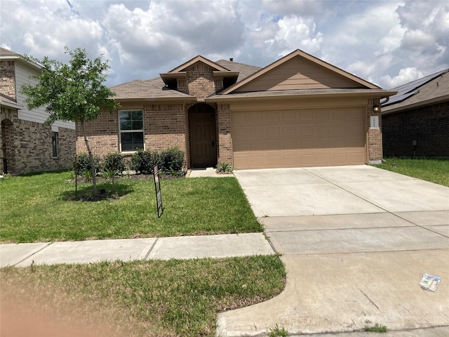 15443 Cipres Verde St, Channelview, TX 77530 - view of front facade featuring brick siding, concrete driveway, an attached garage, and a front lawn