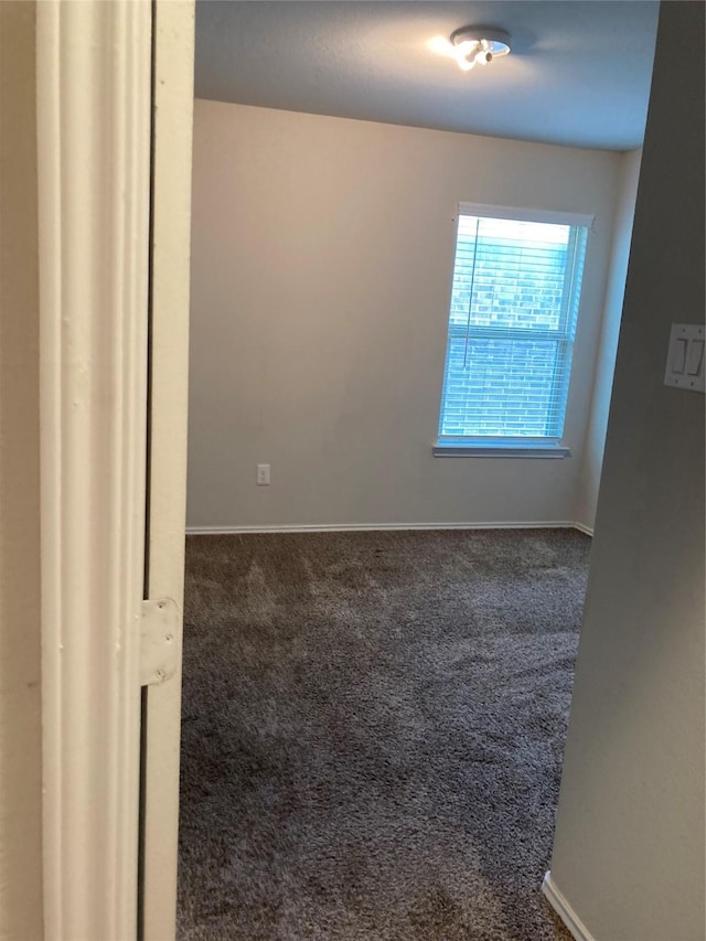 15443 Cipres Verde St, Channelview, TX 77530 - spare room featuring carpet and baseboards