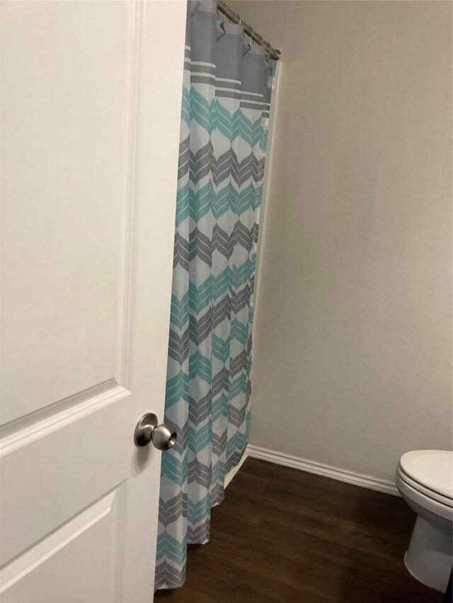 15443 Cipres Verde St, Channelview, TX 77530 - full bath with wood finished floors and curtained shower
