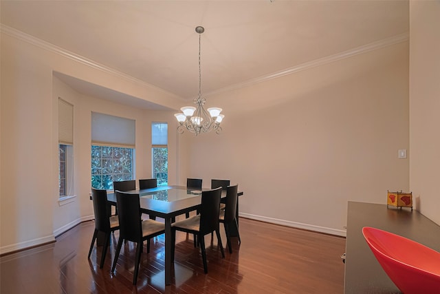8707 Crossriver Ln, Houston, TX 77095 - dining space with crown molding, dark wood-type flooring, and a chandelier