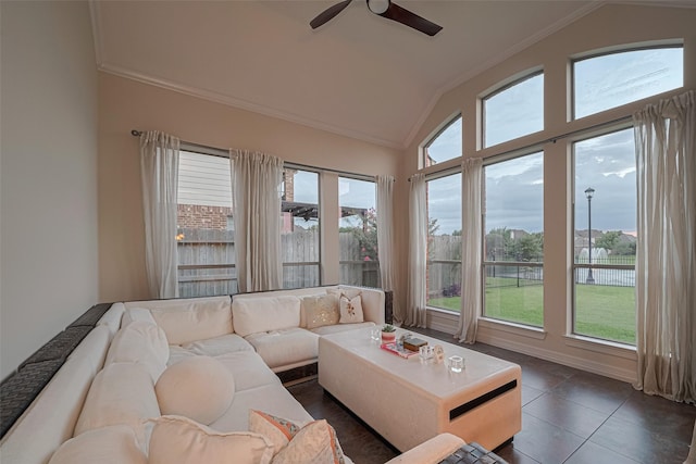 8707 Crossriver Ln, Houston, TX 77095 - living room featuring vaulted ceiling, a ceiling fan, ornamental molding, and dark tile patterned flooring
