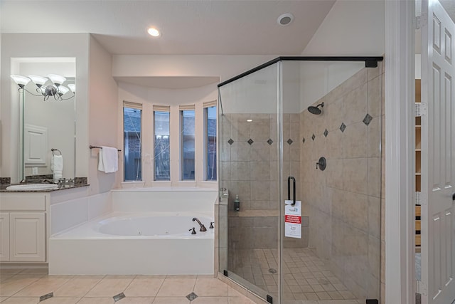 8707 Crossriver Ln, Houston, TX 77095 - bathroom with a tub with jets, a shower stall, tile patterned flooring, vanity, and recessed lighting