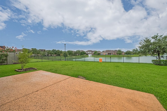 8707 Crossriver Ln, Houston, TX 77095 - fenced backyard featuring a water view and a patio