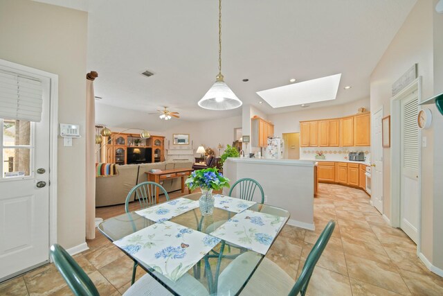 1512 Pine Ridge Ln, Pearland, TX 77581 - dining space with a skylight, a ceiling fan, and recessed lighting