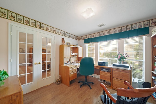 1512 Pine Ridge Ln, Pearland, TX 77581 - office with french doors, light wood-style floors, and plenty of natural light