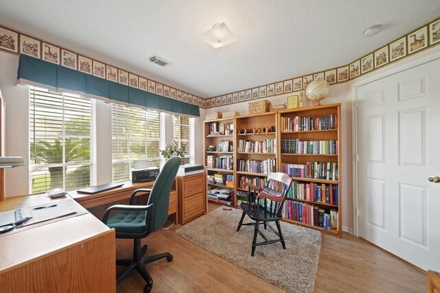 1512 Pine Ridge Ln, Pearland, TX 77581 - office space featuring light wood finished floors