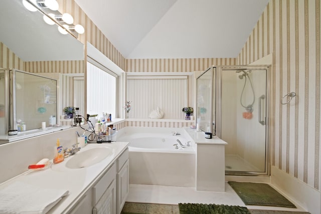 1512 Pine Ridge Ln, Pearland, TX 77581 - bathroom with wallpapered walls, lofted ceiling, a bath, a stall shower, and vanity