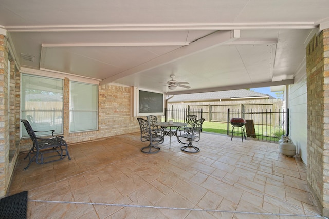 1512 Pine Ridge Ln, Pearland, TX 77581 - view of patio with ceiling fan and outdoor dining space