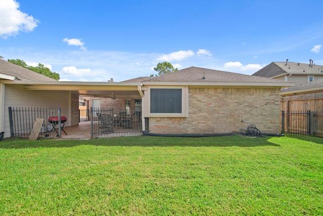 1512 Pine Ridge Ln, Pearland, TX 77581 - back of house with a patio area and brick siding
