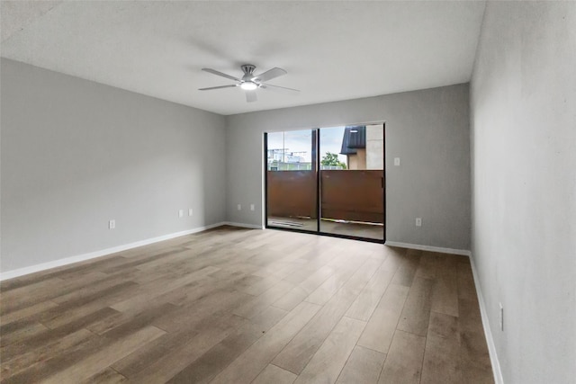 8423 Hearth Dr Unit 26, Houston, TX 77054 - spare room with a ceiling fan and wood finished floors