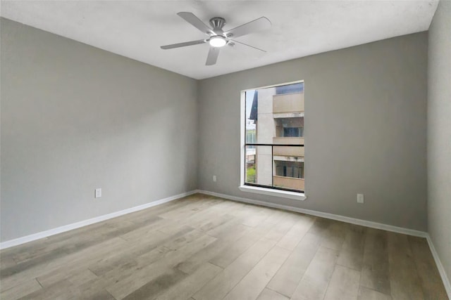 8423 Hearth Dr Unit 26, Houston, TX 77054 - spare room featuring wood finished floors and ceiling fan