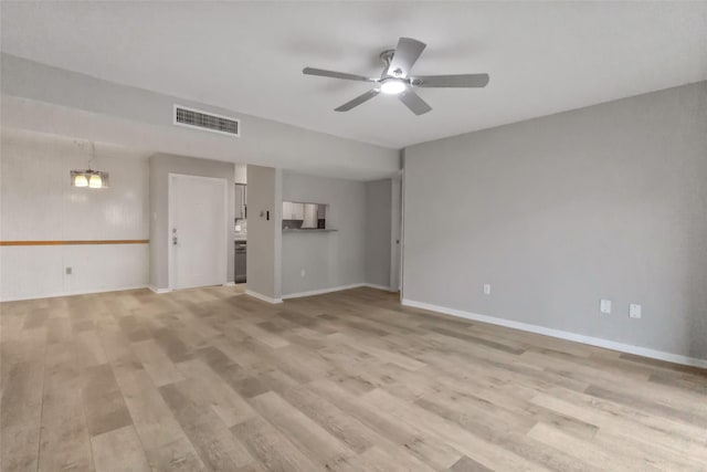 8423 Hearth Dr Unit 26, Houston, TX 77054 - unfurnished living room featuring a ceiling fan and light wood-style flooring