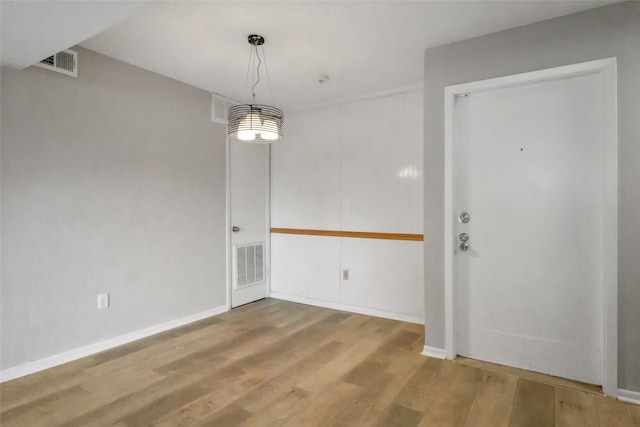 8423 Hearth Dr Unit 26, Houston, TX 77054 - unfurnished dining area featuring wood finished floors and baseboards