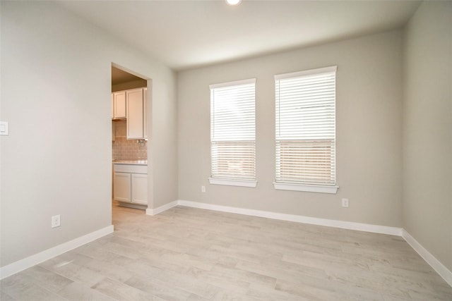 11110 Crocus Dr, Houston, TX 77044 - empty room featuring light wood-type flooring and recessed lighting