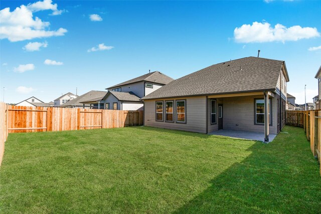 11110 Crocus Dr, Houston, TX 77044 - rear view of property with a patio, a fenced backyard, and roof with shingles