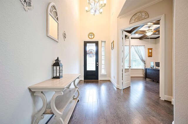 19415 Maifest Dr, Cypress, TX 77433 - entrance foyer featuring ornamental molding, a chandelier, dark wood-style floors, and ceiling fan