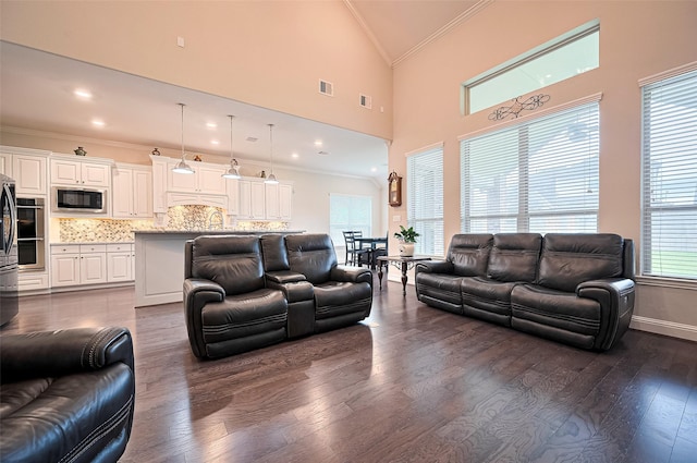 19415 Maifest Dr, Cypress, TX 77433 - living area featuring crown molding, dark wood finished floors, and high vaulted ceiling