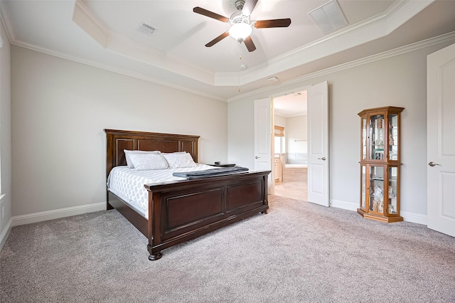 19415 Maifest Dr, Cypress, TX 77433 - bedroom with a raised ceiling, carpet, ornamental molding, a ceiling fan, and ensuite bath