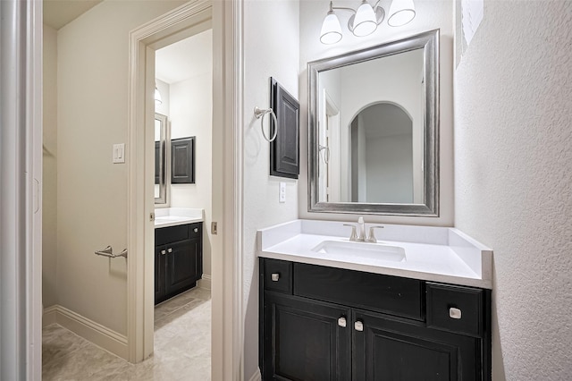 19415 Maifest Dr, Cypress, TX 77433 - bathroom with vanity and a textured wall