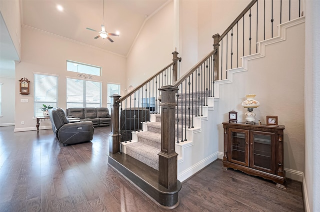 19415 Maifest Dr, Cypress, TX 77433 - staircase with high vaulted ceiling, wood finished floors, ornamental molding, and a ceiling fan