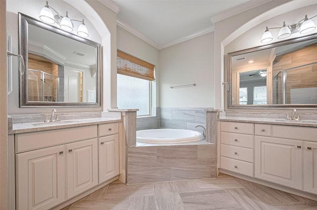 19415 Maifest Dr, Cypress, TX 77433 - bathroom with ornamental molding, a shower stall, two vanities, and a bath