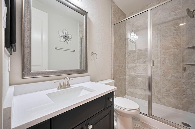 19415 Maifest Dr, Cypress, TX 77433 - full bathroom featuring vanity, a stall shower, and a textured wall