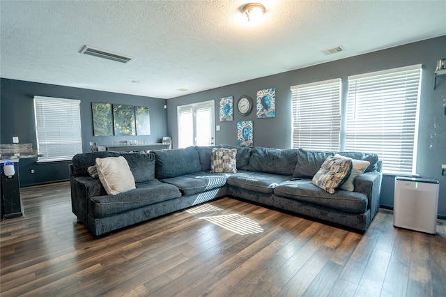 1119 Grassy View Dr, Houston, TX 77073 - living area with hardwood / wood-style floors and a textured ceiling