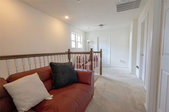 1119 Grassy View Dr, Houston, TX 77073 - sitting room featuring an upstairs landing, light carpet, and recessed lighting
