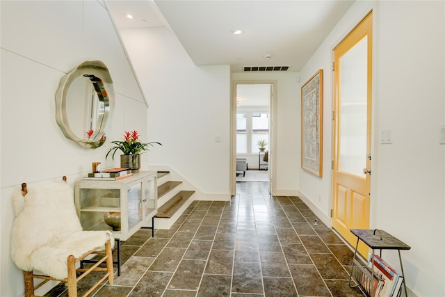 5007 Dickson St, Houston, TX 77007 - foyer with stone finish floors, stairs, and recessed lighting