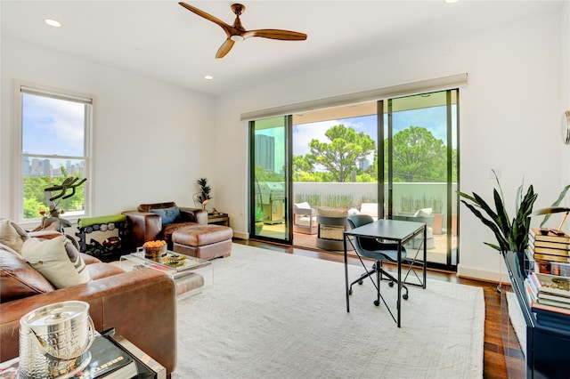 5007 Dickson St, Houston, TX 77007 - living area with healthy amount of natural light, recessed lighting, ceiling fan, and dark wood-type flooring