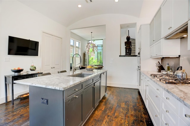 5007 Dickson St, Houston, TX 77007 - kitchen with appliances with stainless steel finishes, dark wood-style floors, gray cabinets, light stone counters, and white cabinets