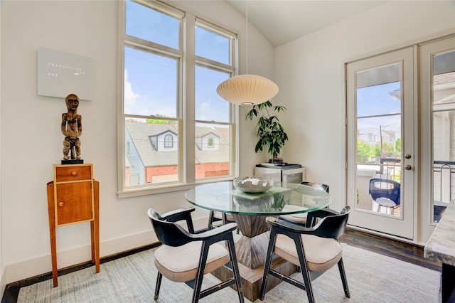 5007 Dickson St, Houston, TX 77007 - dining area with wood finished floors and vaulted ceiling